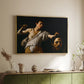 Gold floater framed canvas of David with the Head of Goliath (Vienna Version), c. 1607 by Caravaggio, featuring a biblical scene of David gripping Goliath's head with dramatic lighting above a sideboard in a softly lit hallway.