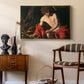 Saint John the Baptist in the Wilderness, c. 1603-1604 by Caravaggio as a gold floater framed canvas featuring a biblical youth seated outdoors with symbolic staff and minimal landscape, styled above a mid-century console in a contemporary living area.