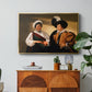 The Fortune Teller (Louvre Version), c. 1595 by Caravaggio in a gold floater framed canvas featuring a woman reading a young man's palm while secretly stealing his ring, displayed above a wood console cabinet.