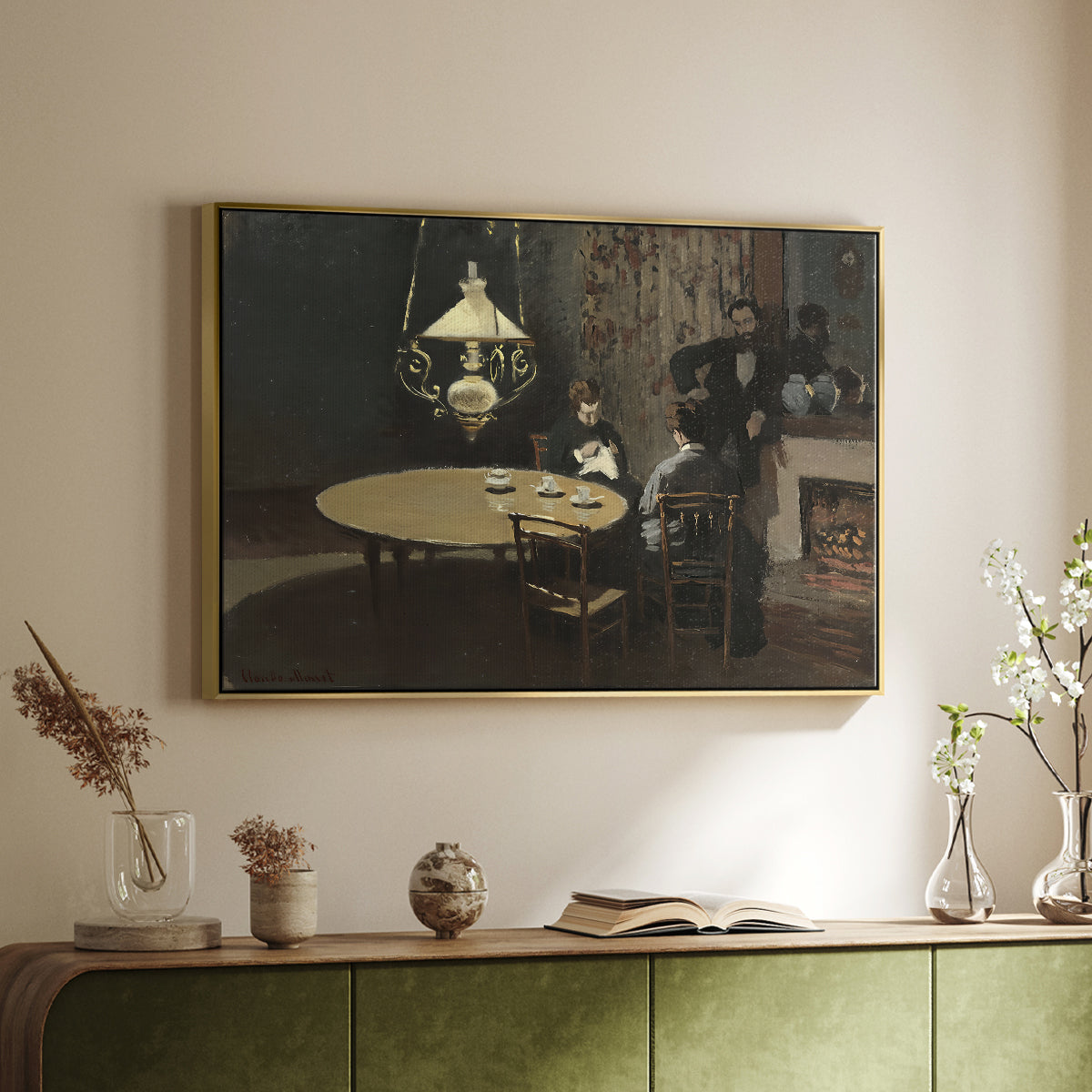 Gold floater framed canvas of Interior, after Dinner, 1868-1869 by Claude Monet, featuring a quiet domestic scene with lamp-lit table and subdued atmosphere above a sideboard in a softly lit hallway.