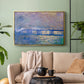 Gold floater framed canvas featuring a city bridge scene softened by mist and impressionist brushwork, displayed above a sofa in a modern living room.