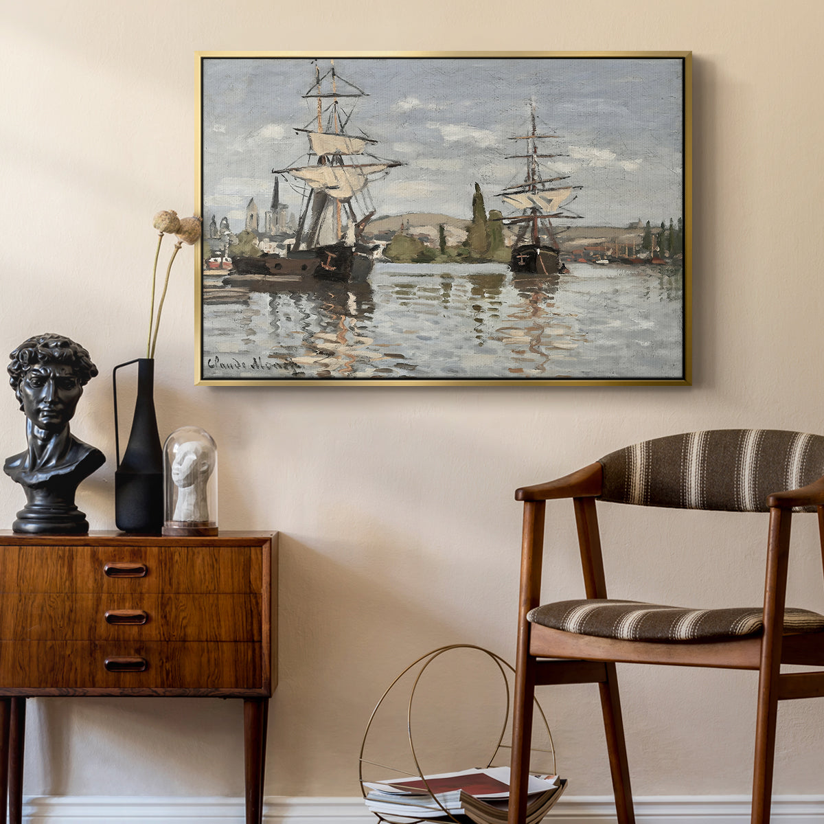 Ships Riding on the Seine at Rouen, 1872 by Claude Monet as a gold floater framed canvas featuring a harbor view with tall ships lining the waterfront in muted tones, styled above a mid-century console in a contemporary living area.