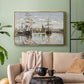 Gold floater framed canvas featuring a nautical landscape with vessels resting on calm water, displayed above a sofa in a modern living room.