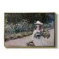 Young Girl in the Garden at Giverny, 1888 by Claude Monet in a gold floater framed canvas wall art display.