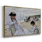 Angled view of On the Beach at Trouville, 1870 by Claude Monet in a gold floater framed canvas.