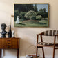 Woman in the Garden, Sainte-Adresse, 1867 by Claude Monet as a gold floater framed canvas featuring an elegant woman posed outdoors among blooming plants, styled above a mid-century console in a contemporary living area.