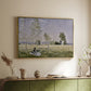 Gold floater framed canvas of Summer (L'ete), 1874 by Claude Monet, featuring an impressionist countryside scene with figure resting in shade above a sideboard in a softly lit hallway.
