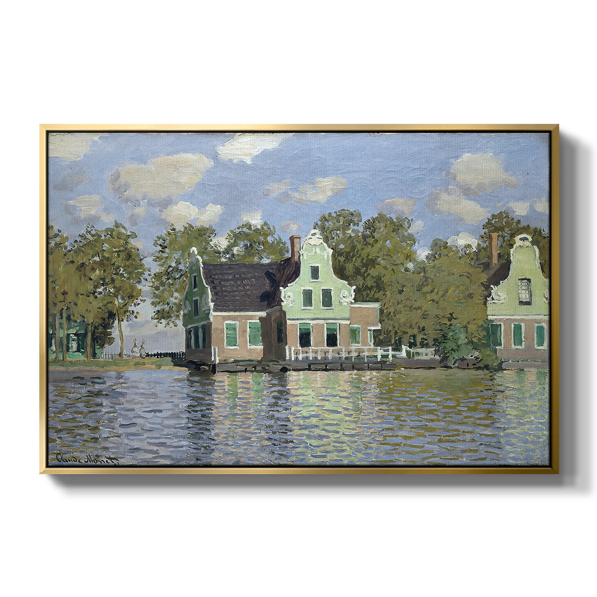 Houses on the Zaan River at Zaandam, 1871 by Claude Monet in a gold floater framed canvas wall art display.