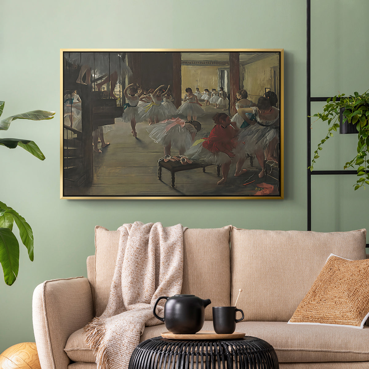 Gold floater framed canvas featuring a group of dancers preparing during class with natural light, displayed above a sofa in a modern living room.
