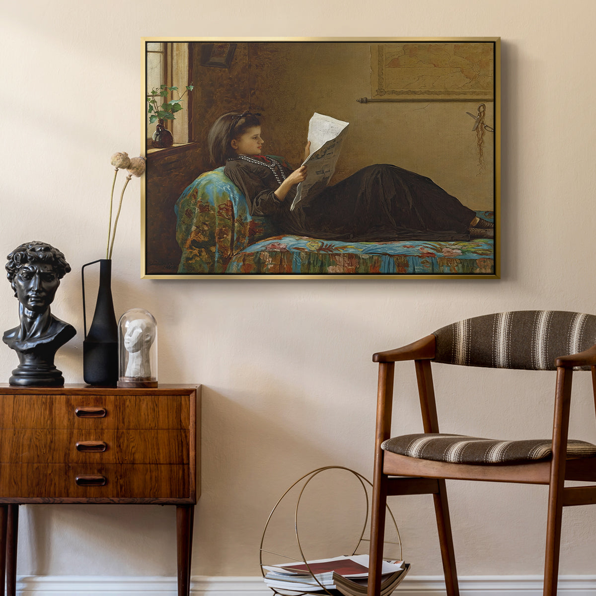 Interesting News, 1872 by Eastman Johnson as a gold floater framed canvas featuring an Americana interior with people focused on printed page, styled above a mid-century console in a contemporary living area.