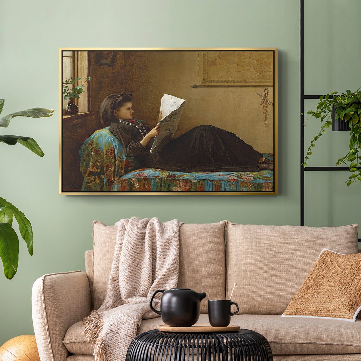 Gold floater framed canvas featuring a casual gathering around newspaper in rustic room, displayed above a sofa in a modern living room.