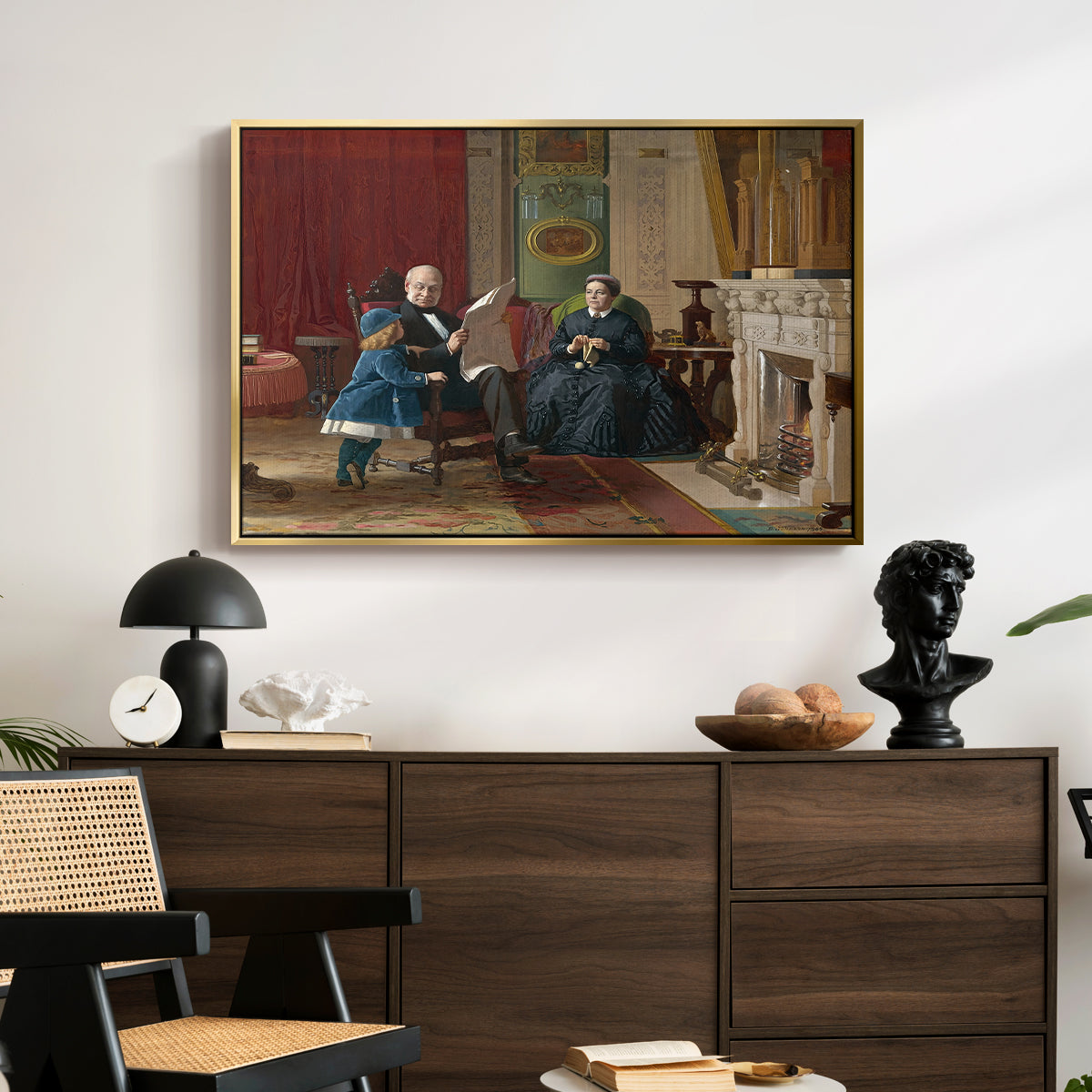 The Brown Family, 1869 by Eastman Johnson displayed in a gold floater framed canvas above a dark wood credenza in an entryway.