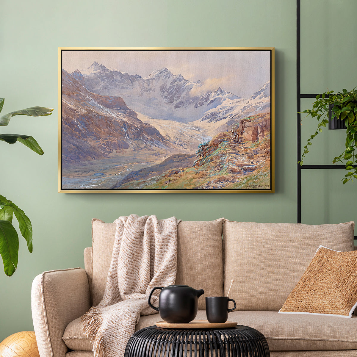Gold floater framed canvas featuring an expansive alpine view with ice and distant mountains, displayed above a sofa in a modern living room.