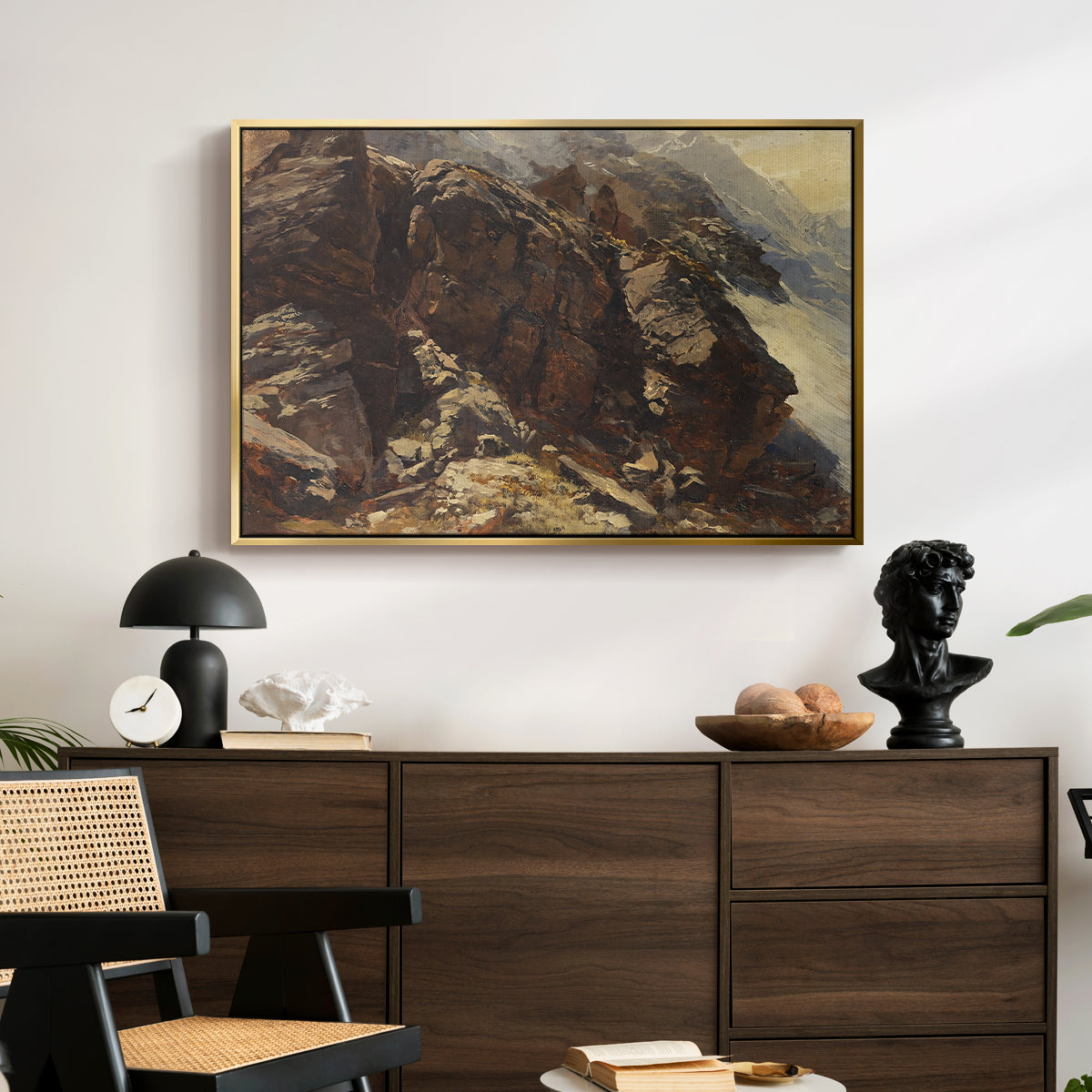 High Mountain Study, c. 1870 by Edward Theodore Compton displayed in a gold floater framed canvas above a dark wood credenza in an entryway.