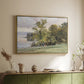 Gold floater framed canvas of Landscape at Lake Starnberg, 1890 by Edward Theodore Compton, featuring a peaceful lake scene with reflections and surrounding greenery above a sideboard in a softly lit hallway.
