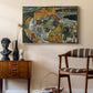 Crescent of Houses II (Island Town), 1915 by Egon Schiele as a gold floater framed canvas featuring an expressionist depiction of island town with geometric forms, styled above a mid-century console in a contemporary living area.