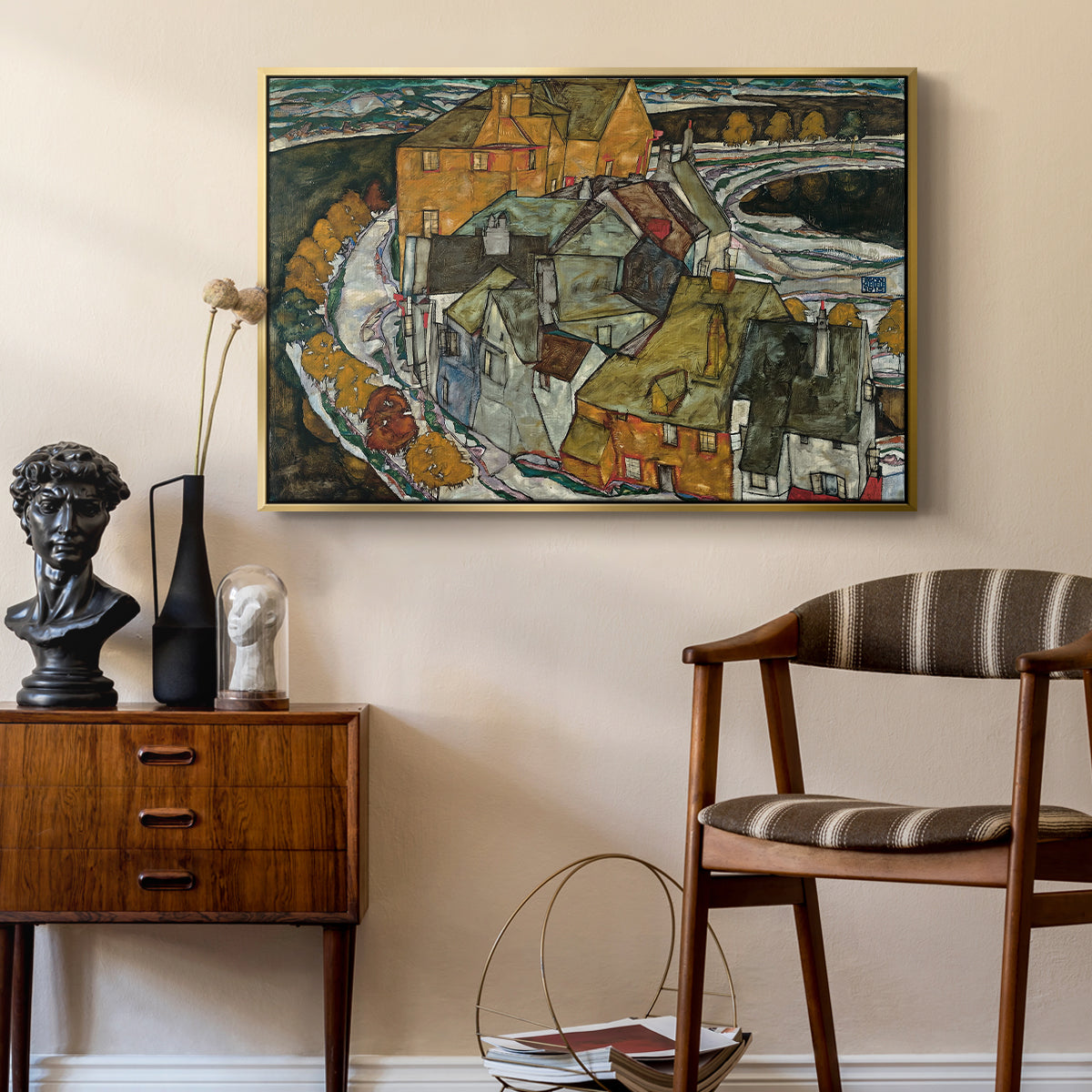 Crescent of Houses II (Island Town), 1915 by Egon Schiele as a gold floater framed canvas featuring an expressionist depiction of island town with geometric forms, styled above a mid-century console in a contemporary living area.