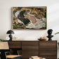 Death and the Maiden, 1915 by Egon Schiele displayed in a gold floater framed canvas above a dark wood credenza in an entryway.