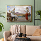Gold floater framed canvas featuring an elegant composition of women performing domestic task, displayed above a sofa in a modern living room.