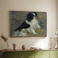 Silver floater framed canvas of Tama, the Japanese Dog, c. 1876 by Pierre-Auguste Renoir, featuring an impressionist painting of a dog wading through water with blurred background above a sideboard in a softly lit hallway.