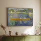 Silver floater framed canvas of The Skiff (La Yole), 1875 by Pierre-Auguste Renoir, featuring an impressionist boating scene with people relaxing in a narrow skiff above a sideboard in a softly lit hallway.
