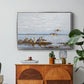 Greylag Geese (Grågäss), 1922 by Bruno Liljefors in a silver floater framed canvas featuring a group of geese gathered near water in a natural wetland landscape, displayed above a wood console cabinet.
