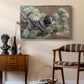Hooded Crows (Kråkor), 1891 by Bruno Liljefors as a silver floater framed canvas featuring a realistic scene of crows interacting on grassy terrain, styled above a mid-century console in a contemporary living area.
