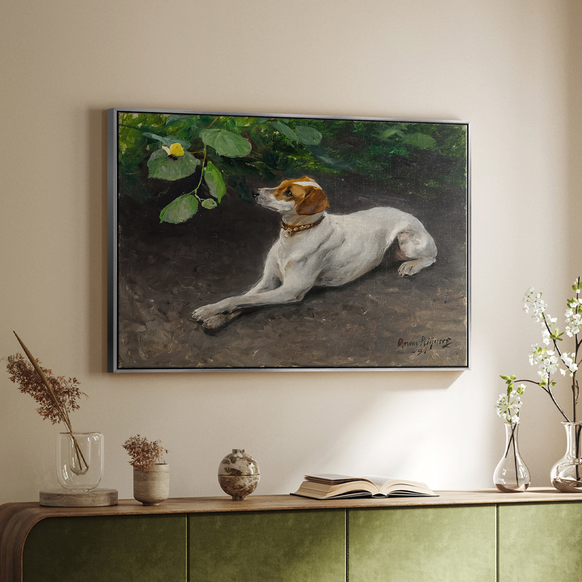 Silver floater framed canvas of Portrait of a Dog, 1891 by Bruno Liljefors, featuring a realistic portrait of a resting dog with attentive expression above a sideboard in a softly lit hallway.
