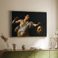 Silver floater framed canvas of David with the Head of Goliath (Vienna Version), c. 1607 by Caravaggio, featuring a biblical scene of David gripping Goliath's head with dramatic lighting above a sideboard in a softly lit hallway.