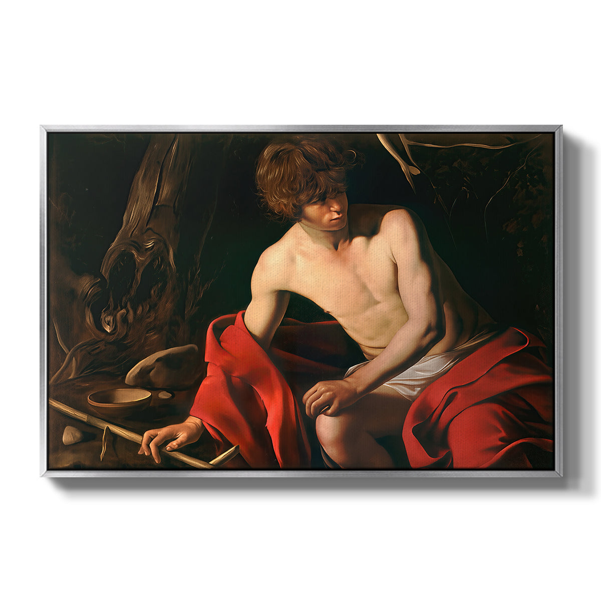 Saint John the Baptist in the Wilderness, c. 1603-1604 by Caravaggio in a silver floater framed canvas wall art display.