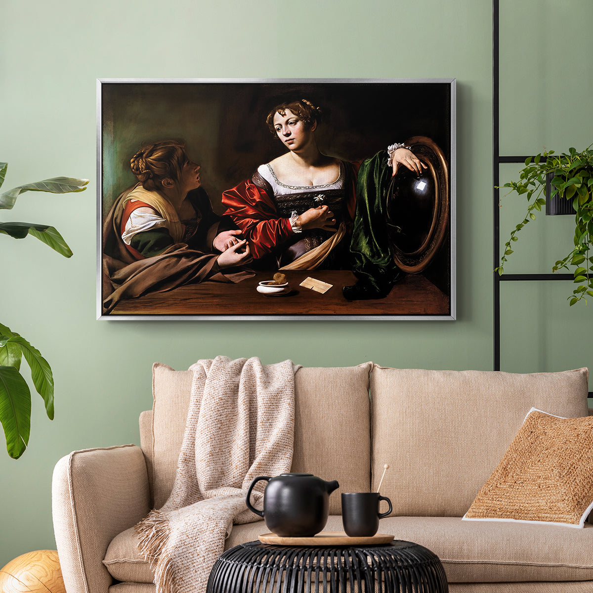 Silver floater framed canvas featuring a religious interior scene with figures engaged in thoughtful dialogue, displayed above a sofa in a modern living room.