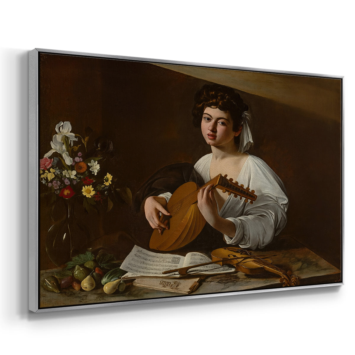 Angled view of The Lute Player (Hermitage Version), c. 1596 by Caravaggio in a silver floater framed canvas.