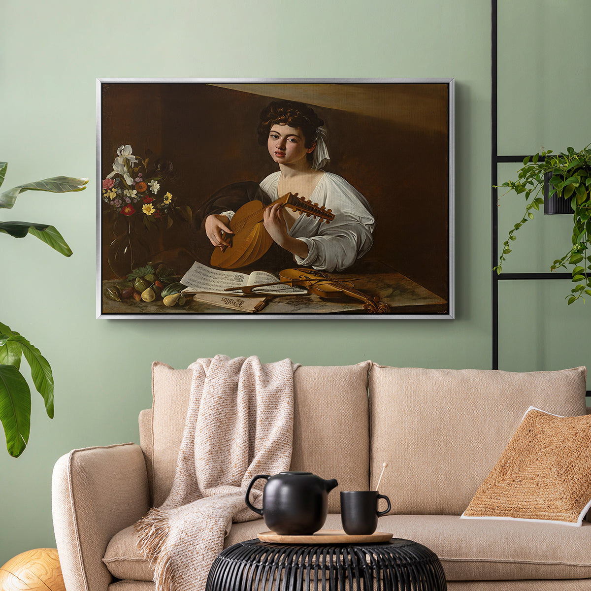 Silver floater framed canvas featuring a Baroque depiction of musician with detailed textures and lighting, displayed above a sofa in a modern living room.