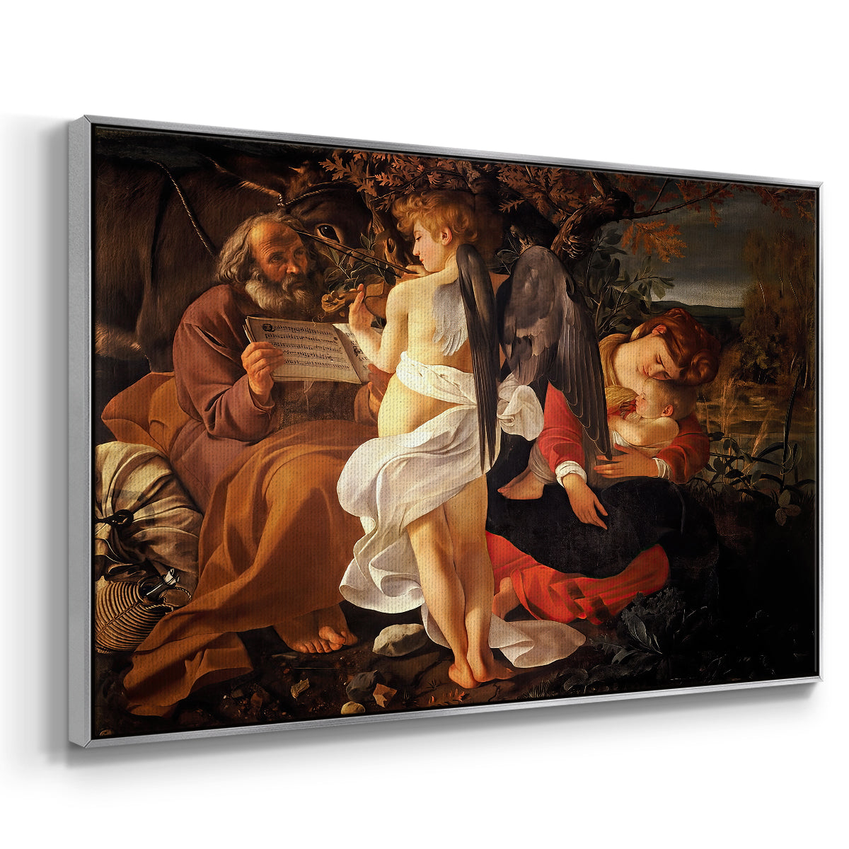 Angled view of Rest on the Flight into Egypt, c. 1597 by Caravaggio in a silver floater framed canvas.