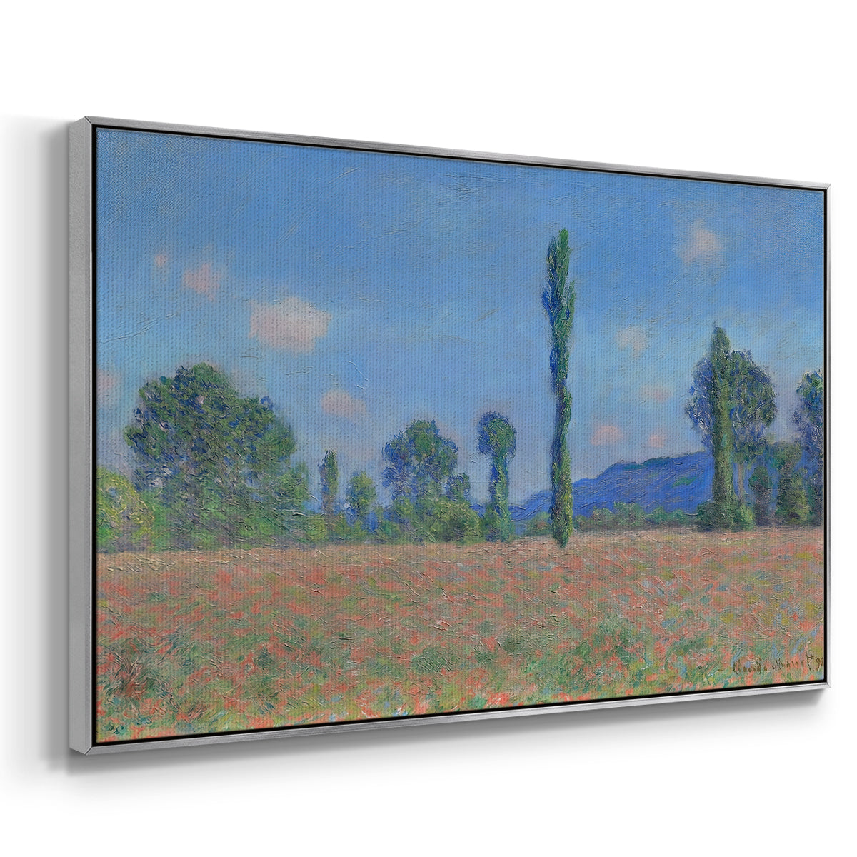 Angled view of Poppy Field (Giverny), 1890-1891 by Claude Monet in a silver floater framed canvas.