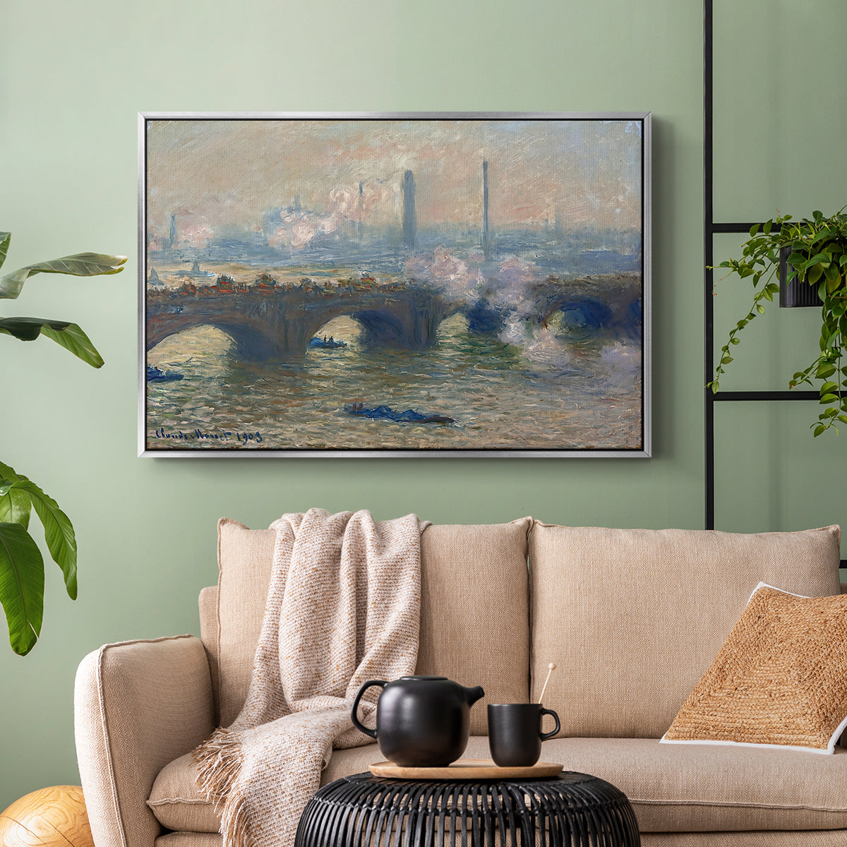 Silver floater framed canvas featuring a foggy London bridge view with softened architectural forms, displayed above a sofa in a modern living room.