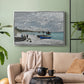Silver floater framed canvas featuring an impressionist seaside gathering with flags and ocean view, displayed above a sofa in a modern living room.