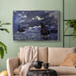 Silver floater framed canvas featuring an atmospheric maritime view with ships in moonlit darkness, displayed above a sofa in a modern living room.
