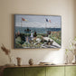 Silver floater framed canvas of Garden at Sainte-Adresse, 1867 by Claude Monet, featuring an impressionist coastal garden with people and ocean view above a sideboard in a softly lit hallway.