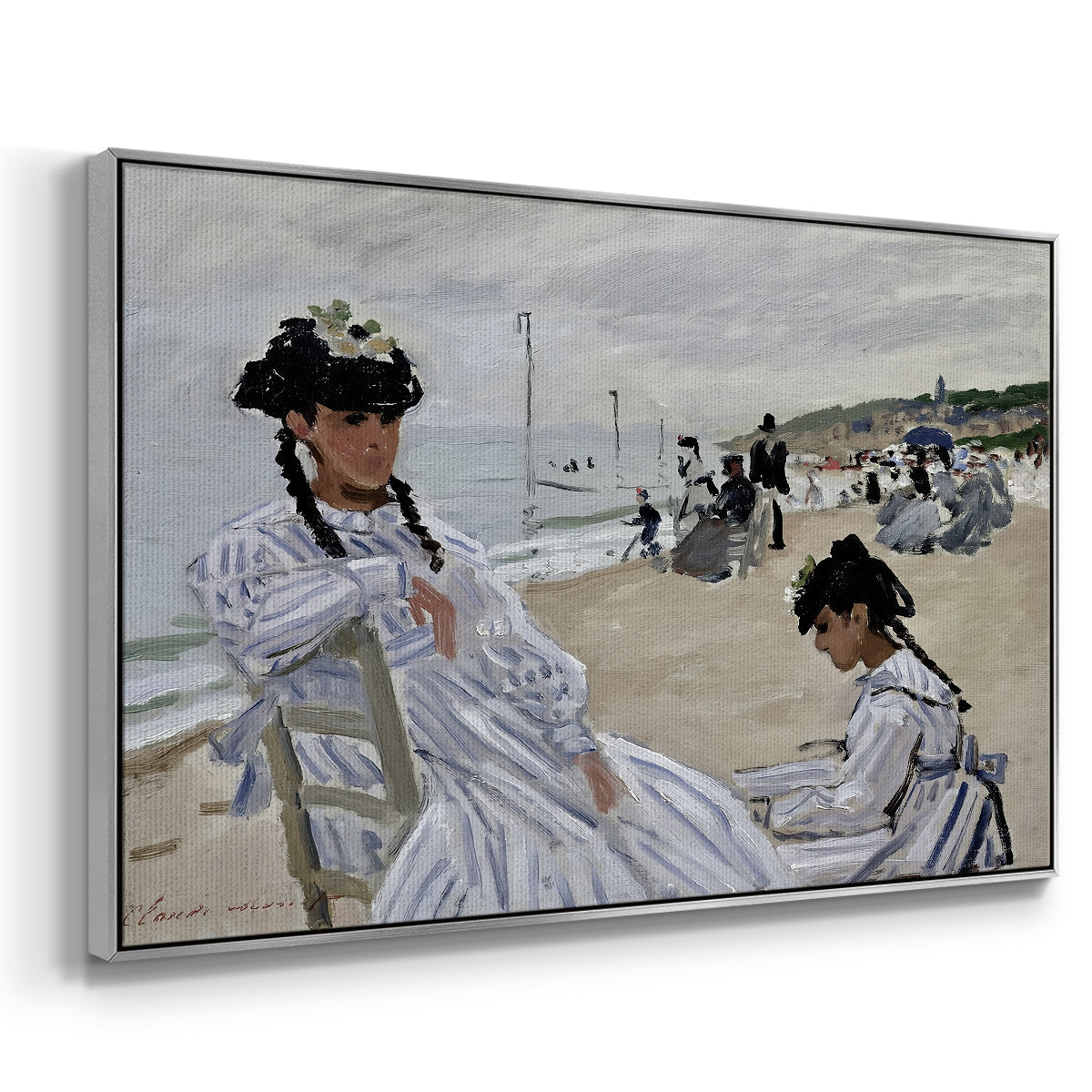 Angled view of On the Beach at Trouville, 1870 by Claude Monet in a silver floater framed canvas.