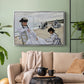 Silver floater framed canvas featuring a coastal leisure scene with figures looking out to sea, displayed above a sofa in a modern living room.