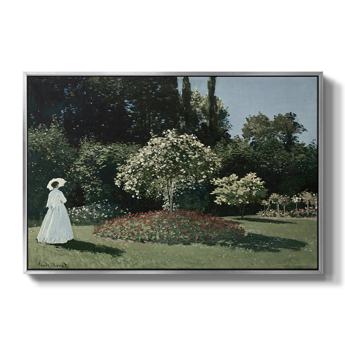 Woman in the Garden, Sainte-Adresse, 1867 by Claude Monet in a silver floater framed canvas wall art display.