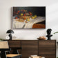Still Life with Apples and Grapes, 1880 by Claude Monet displayed in a silver floater framed canvas above a dark wood credenza in an entryway.