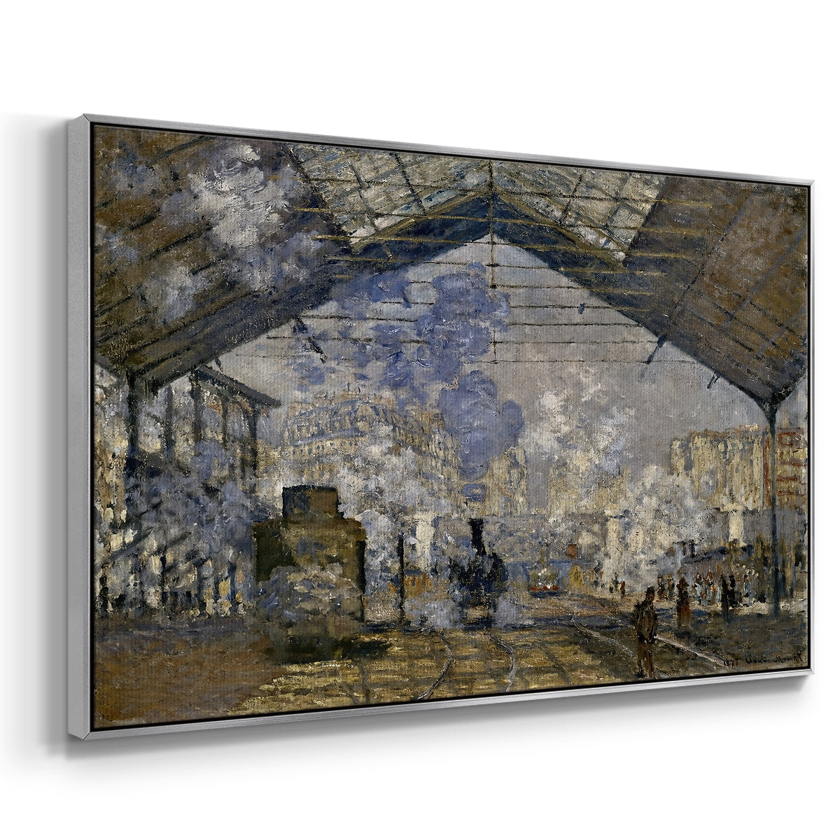 Angled view of The Gare Saint-Lazare, 1877 by Claude Monet in a silver floater framed canvas.