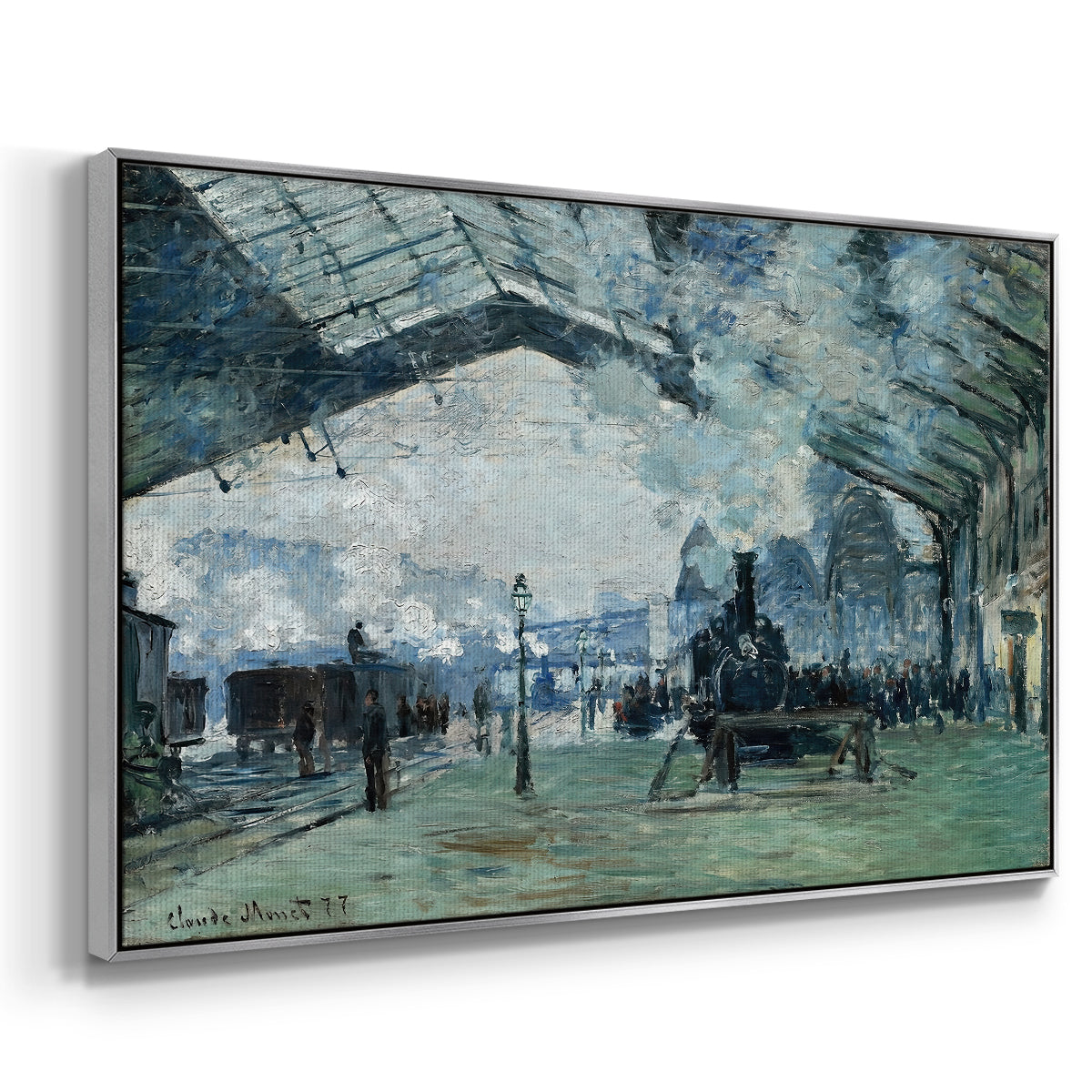 Angled view of The Saint-Lazare Station, 1877 by Claude Monet in a silver floater framed canvas.