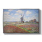 Tulip Fields with the Rijnsburg Windmill, 1886 by Claude Monet in a silver floater framed canvas wall art display.