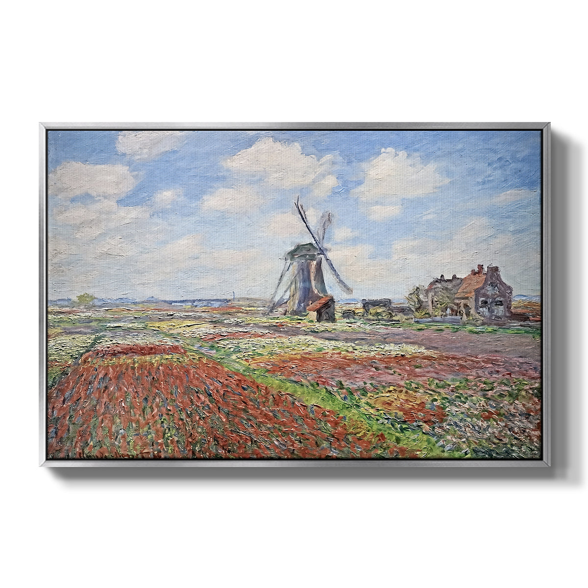 Tulip Fields with the Rijnsburg Windmill, 1886 by Claude Monet in a silver floater framed canvas wall art display.
