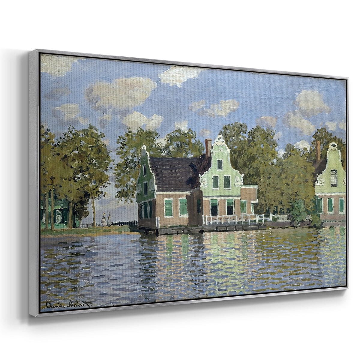 Angled view of Houses on the Zaan River at Zaandam, 1871 by Claude Monet in a silver floater framed canvas.