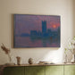 Silver floater framed canvas of The Houses of Parliament, Sunset, 1903 by Claude Monet, featuring an impressionist cityscape with warm sunset light over water above a sideboard in a softly lit hallway.