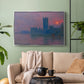 Silver floater framed canvas featuring a dramatic skyline with reflections under colorful sky, displayed above a sofa in a modern living room.